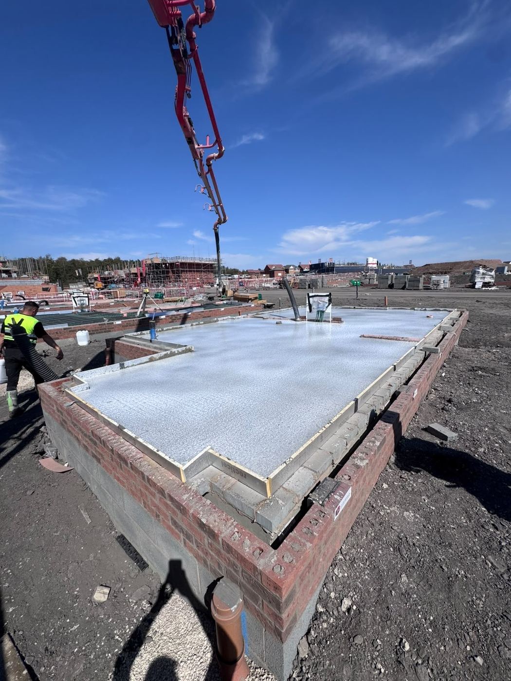 Concrete pour by crane onto a slab