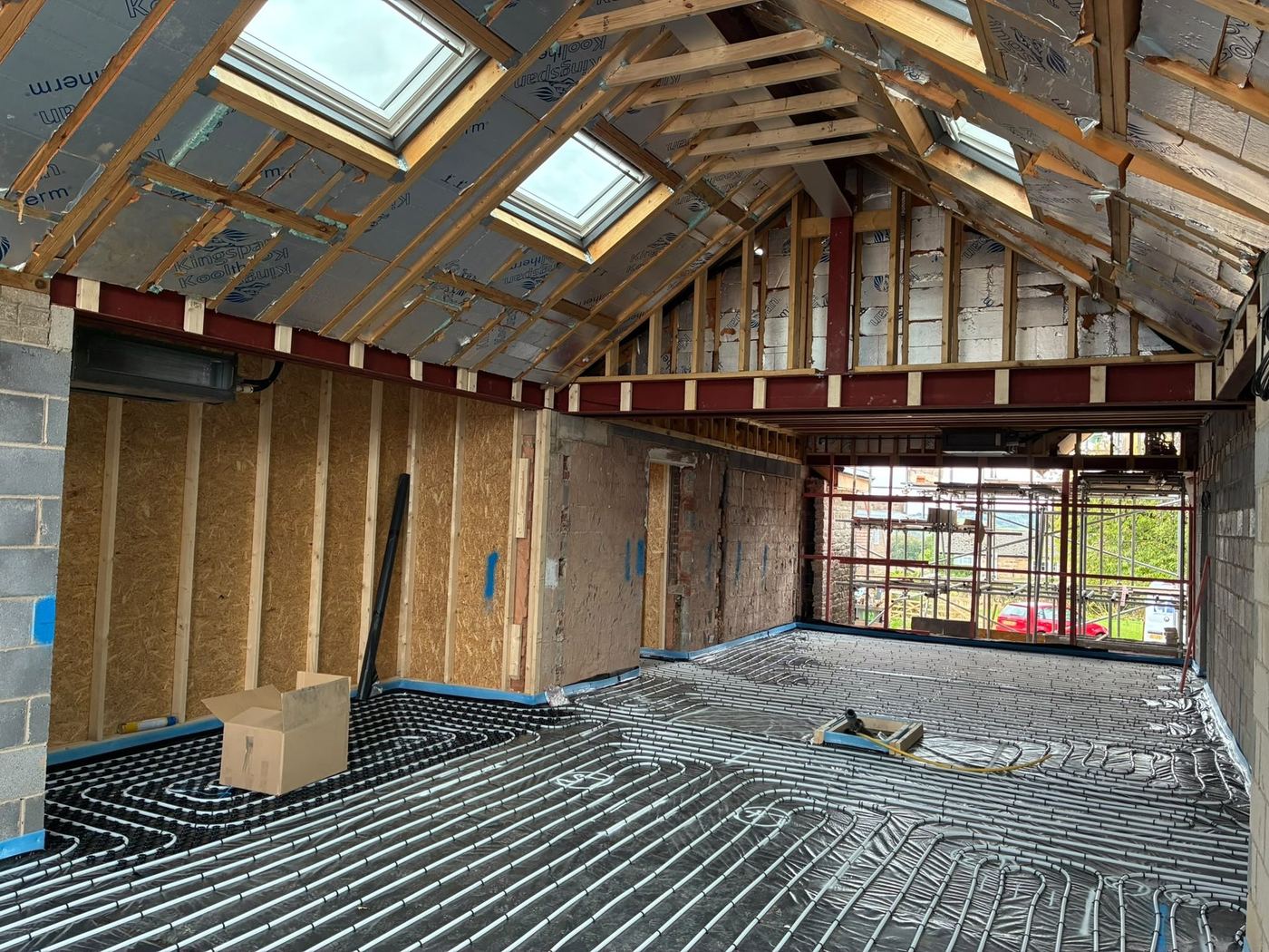 Underfloor heating pipework laid in a roof-truss room